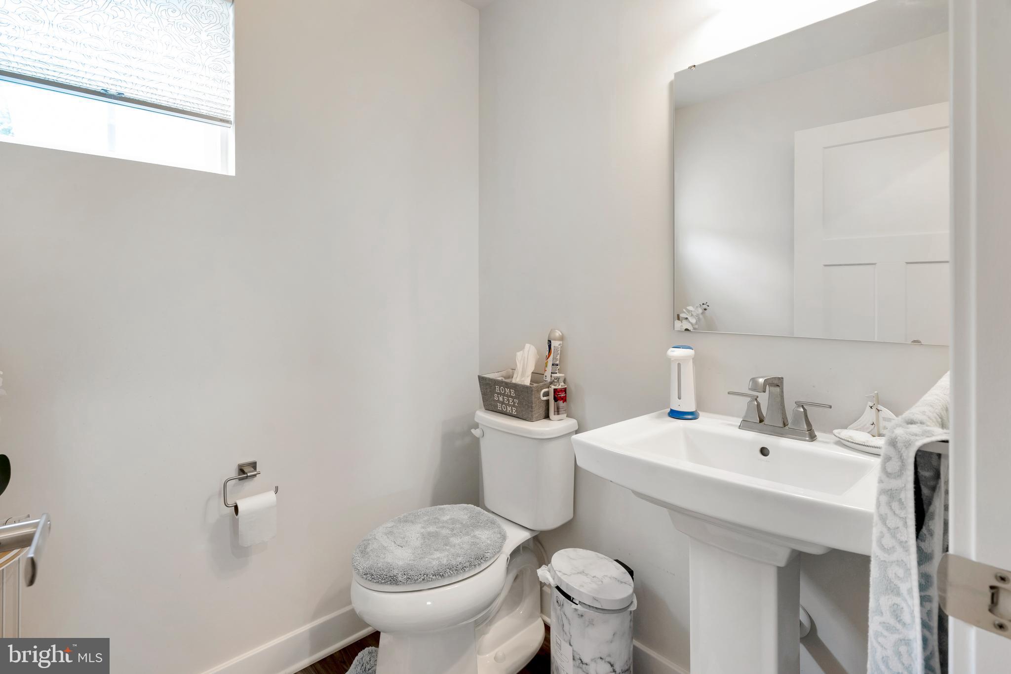 295 Potomac Run Road Fredericksburg, VA 22405 - Photo 25 of 33 a bathroom with a sink and a toilet