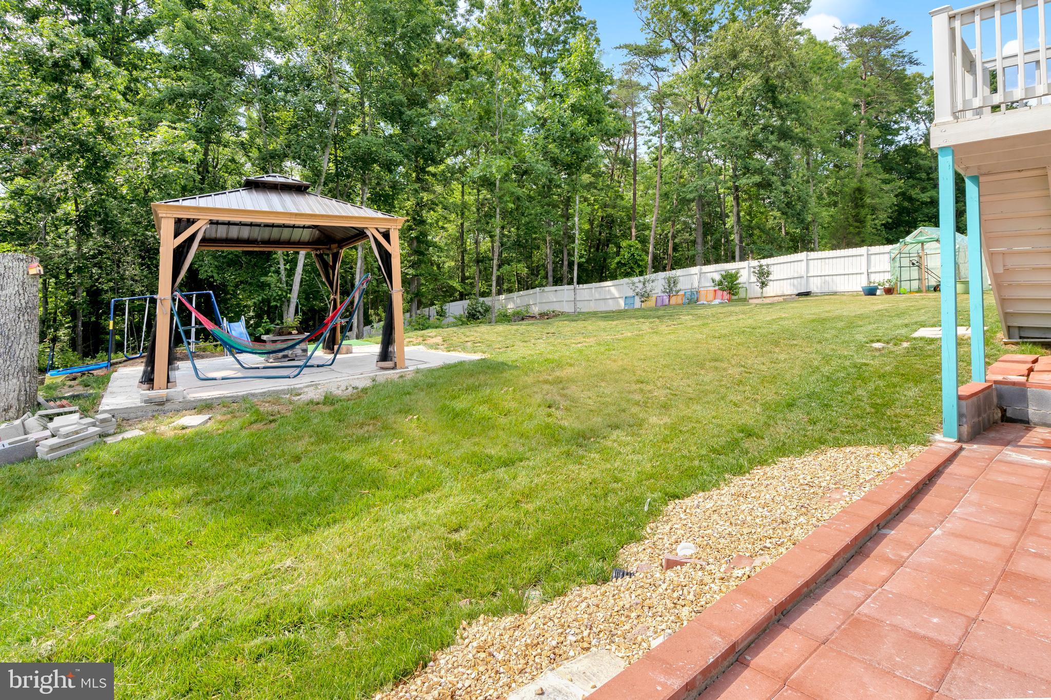 295 Potomac Run Road Fredericksburg, VA 22405 - Photo 28 of 33 a view of a garden with a slide