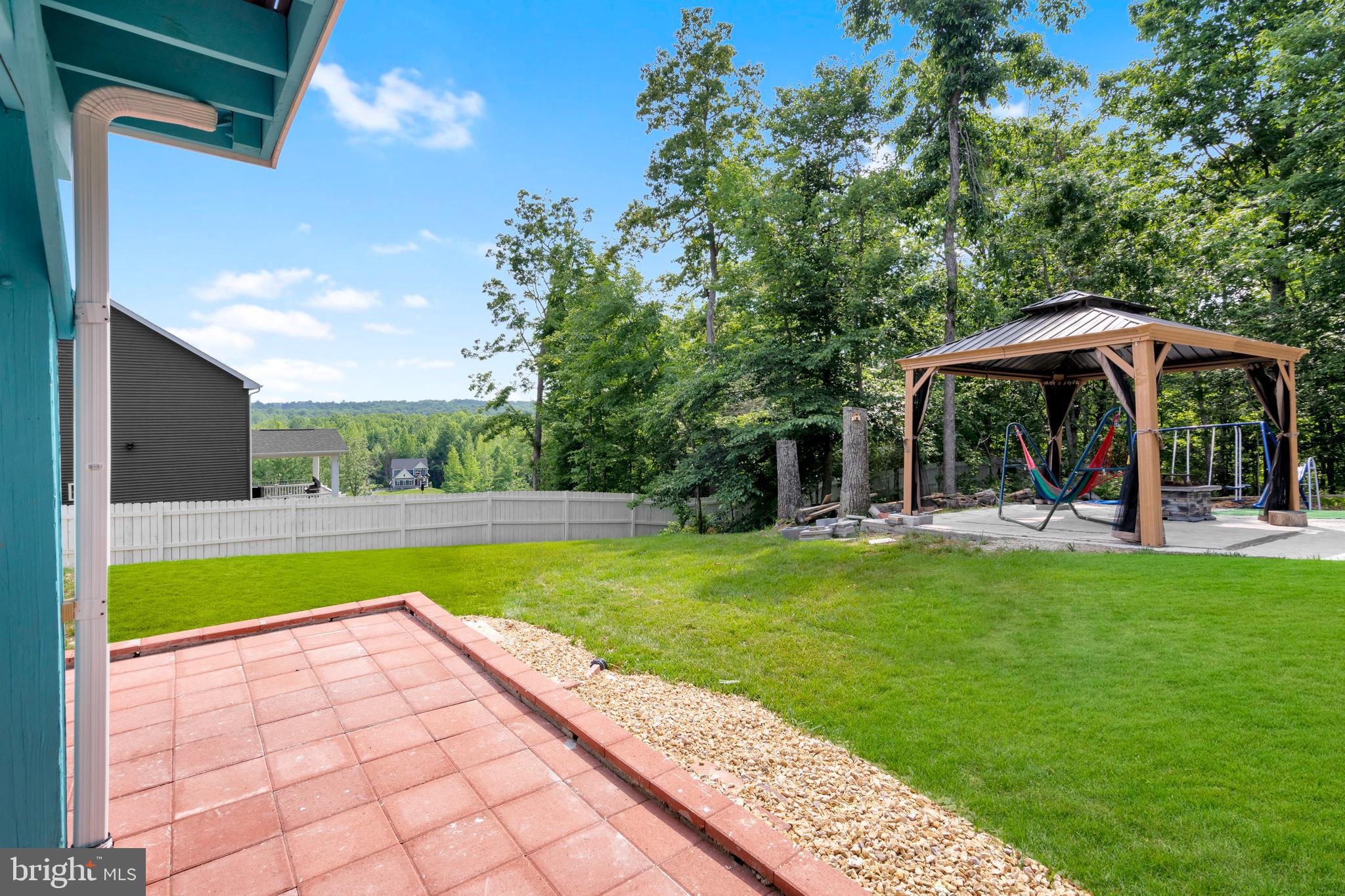 295 Potomac Run Road Fredericksburg, VA 22405 - Photo 29 of 33 a view of a swimming pool and lounge chairs in the patio