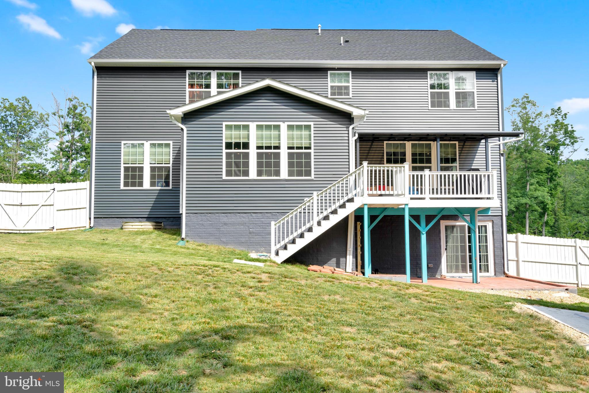 295 Potomac Run Road Fredericksburg, VA 22405 - Photo 32 of 33 a front view of a house with a yard
