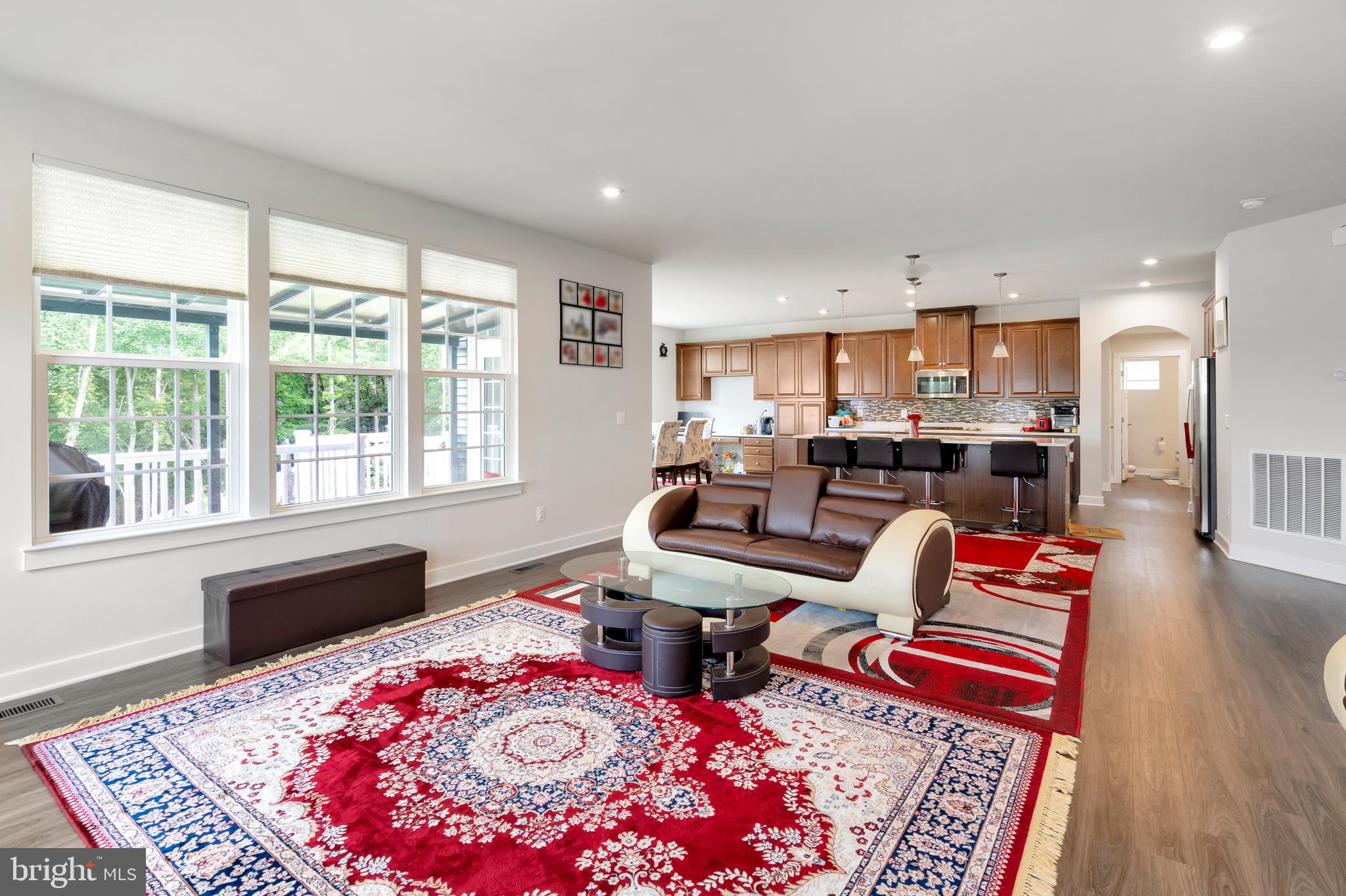 295 Potomac Run Road Fredericksburg, VA 22405 - Photo 5 of 33 a living room with furniture and a rug