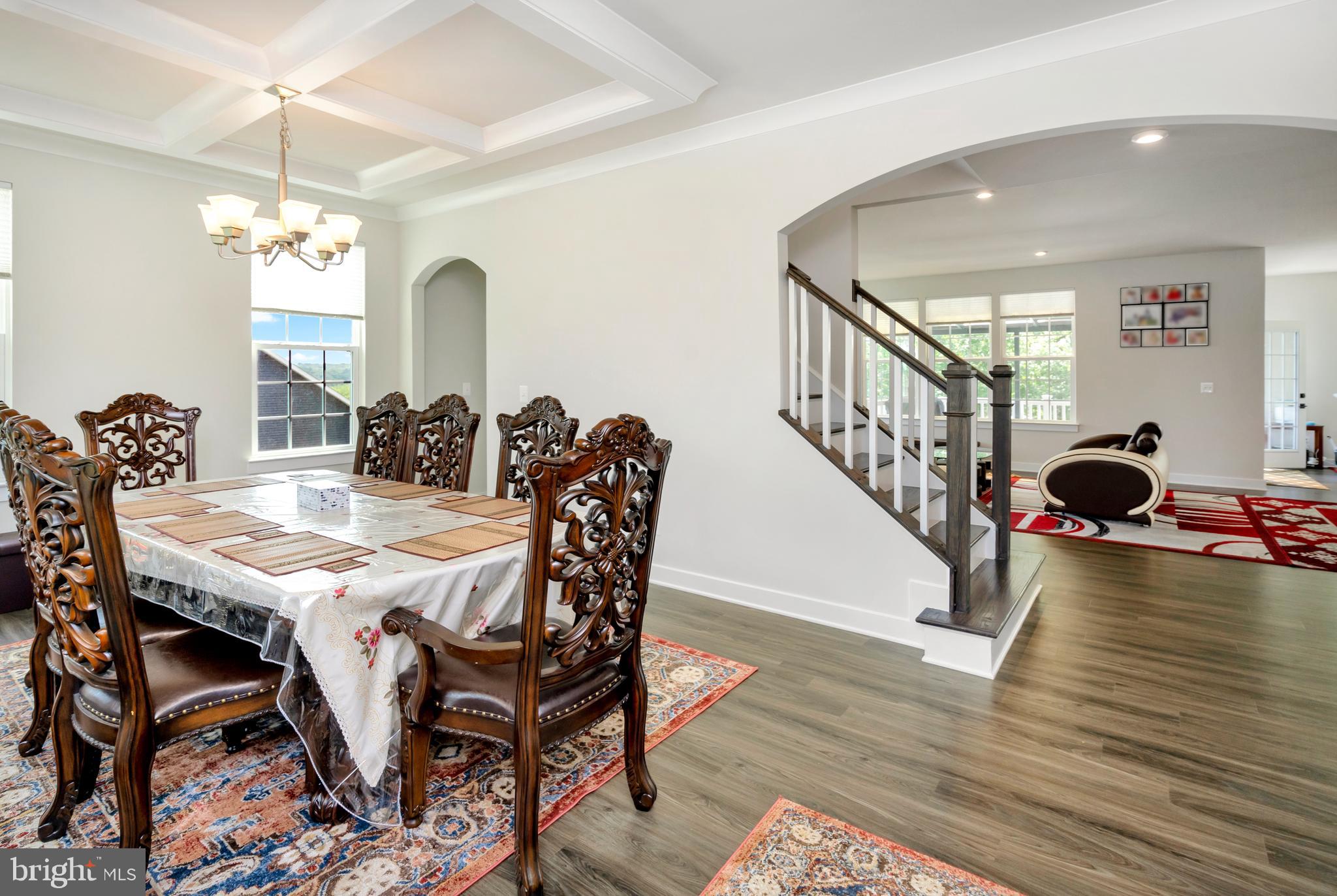 295 Potomac Run Road Fredericksburg, VA 22405 - Photo 8 of 33 a view of a dining room with furniture and wooden floor