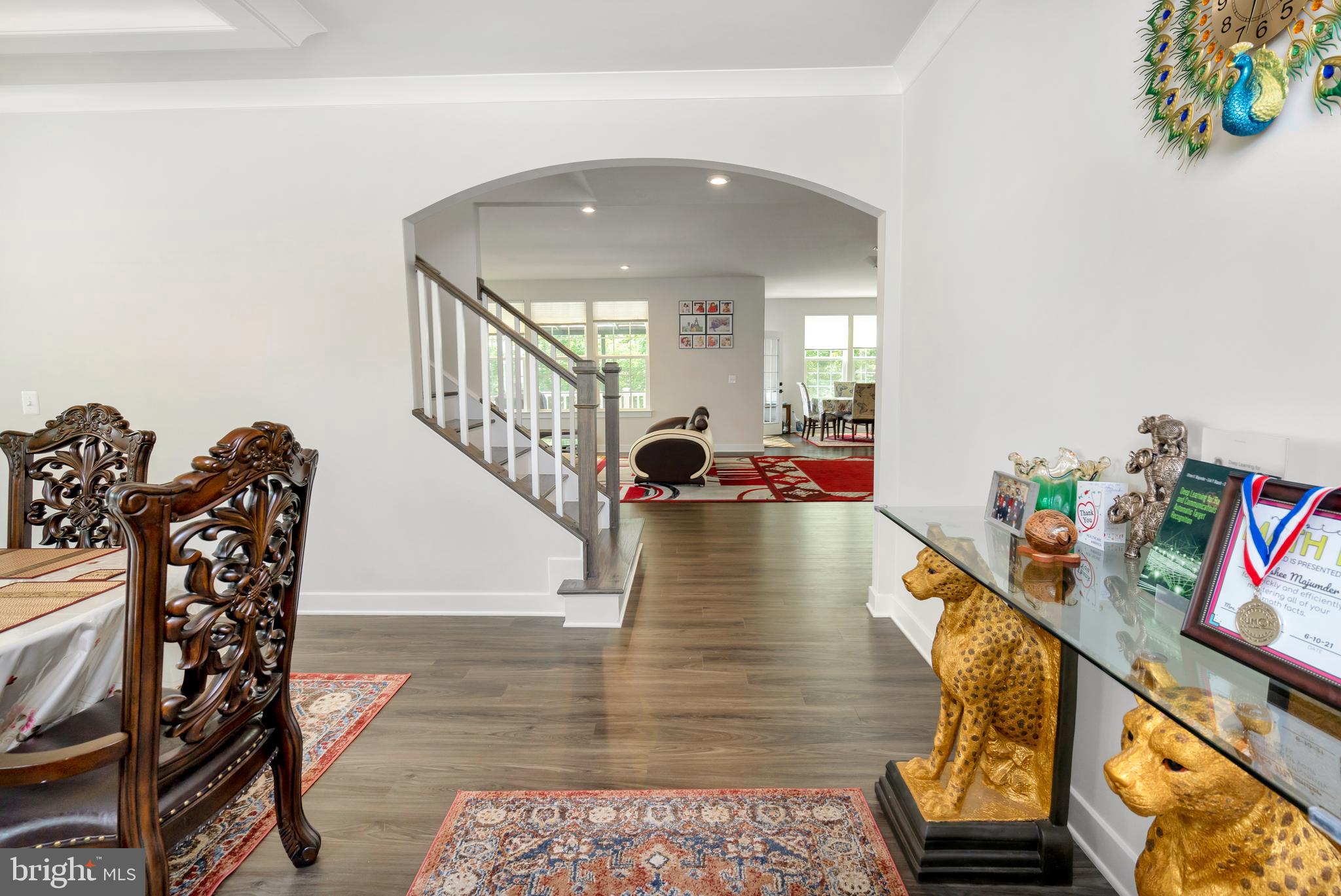 295 Potomac Run Road Fredericksburg, VA 22405 - Photo 9 of 33 a living room with furniture and a wooden floor