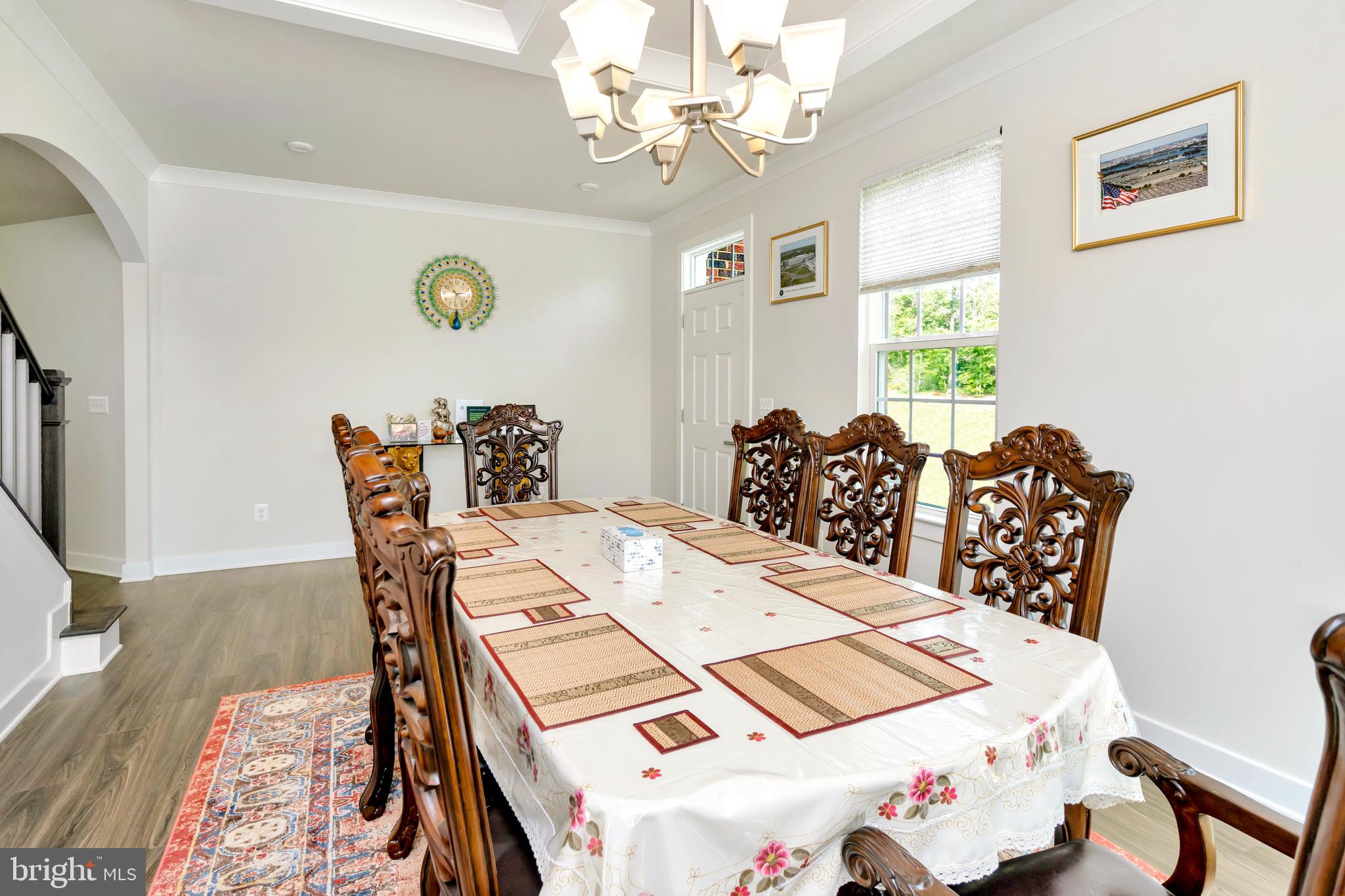 295 Potomac Run Road Fredericksburg, VA 22405 - Photo 10 of 33 a view of a dining room with furniture