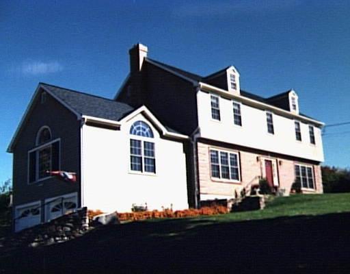 59 Mohegan Road Shelton, CT 06484 - Photo 1 of 1 a front view of a house with a yard