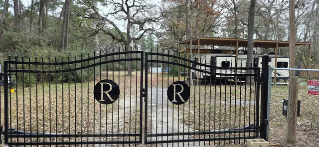 a view of outdoor space with deck and trees