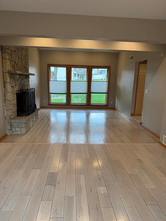 107 Revere Circle Indiana, PA 15701 - Photo 3 of 25 a view of empty room with wooden floor and fireplace