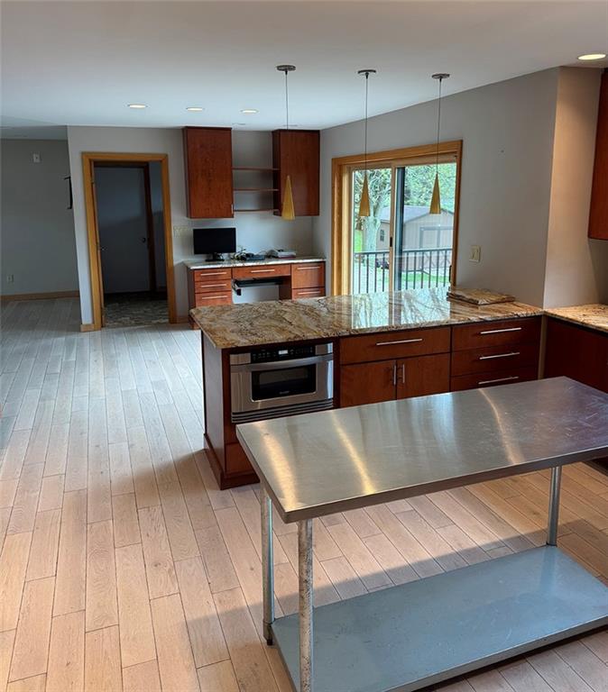 107 Revere Circle Indiana, PA 15701 - Photo 7 of 25 a kitchen with kitchen island a large counter space a sink and a stove