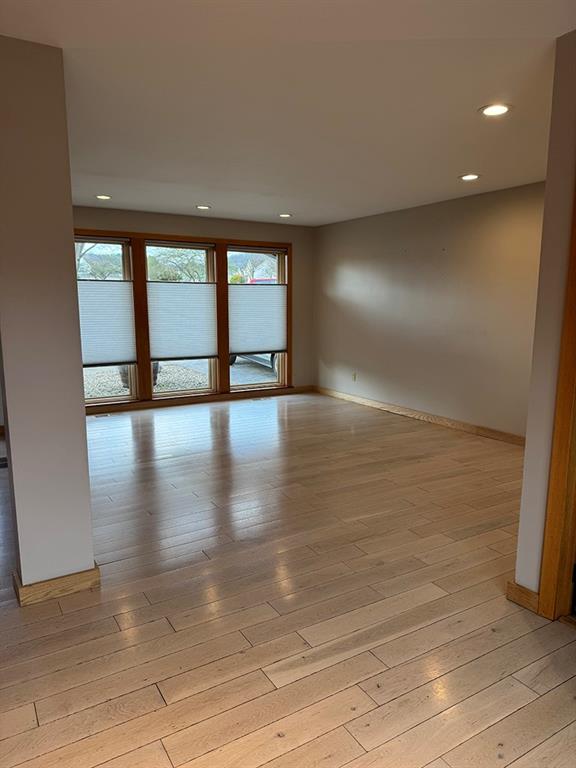 107 Revere Circle Indiana, PA 15701 - Photo 8 of 25 a view of an empty room with wooden floor and a window