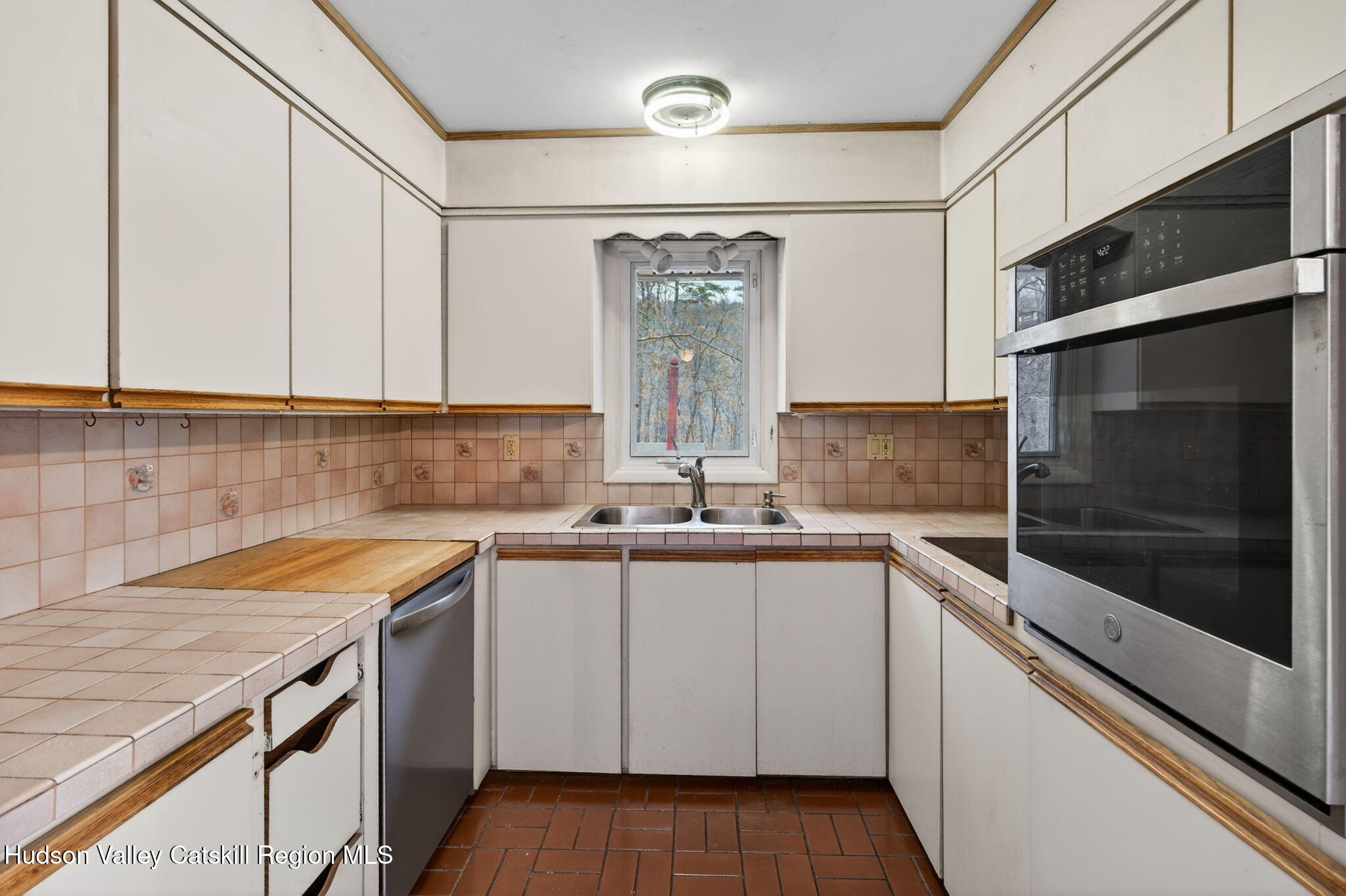 47 Meyers Road Kingston, NY 12401 - Photo 14 of 64 a kitchen with stainless steel appliances granite countertop a sink and cabinets