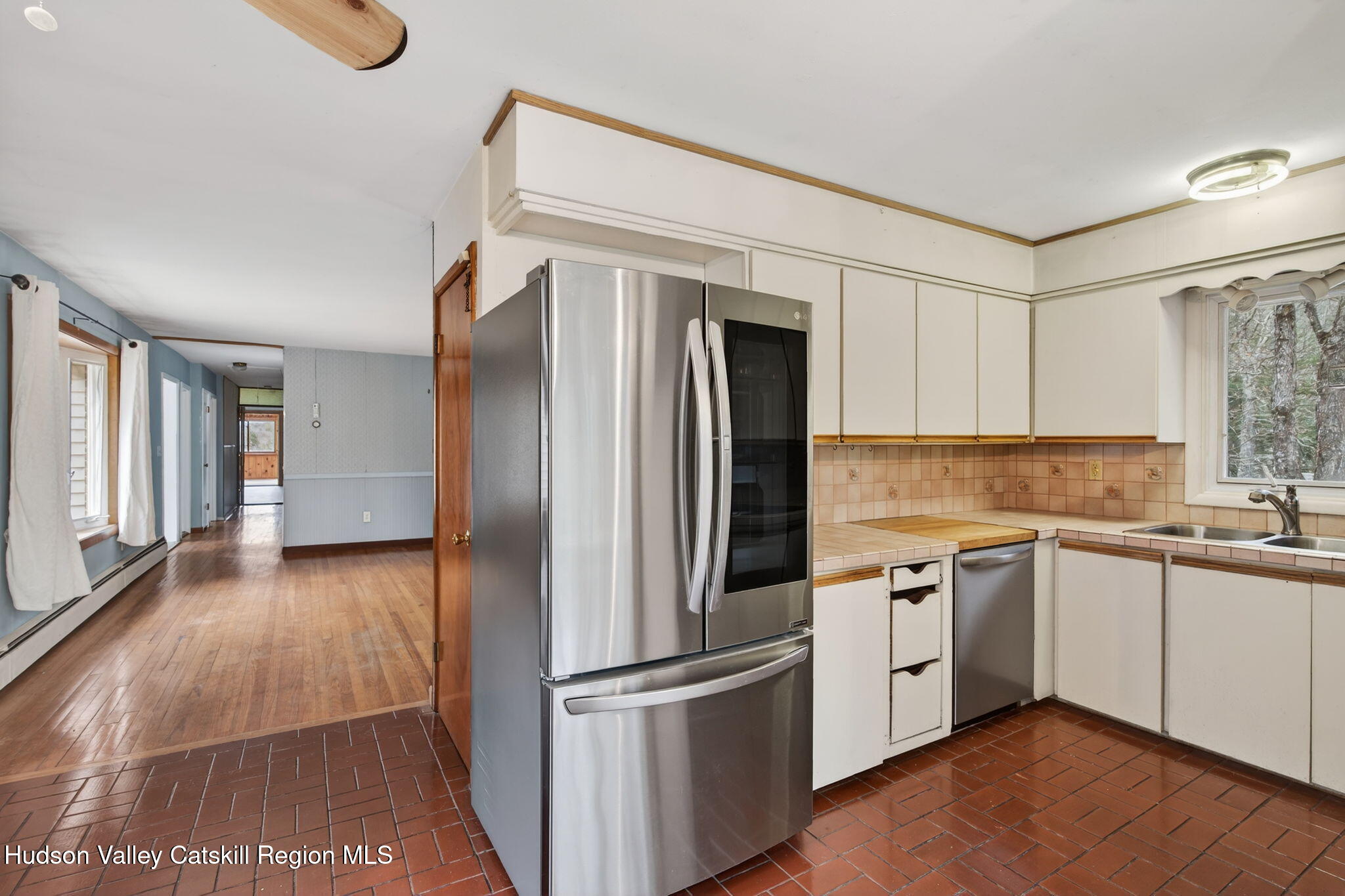 47 Meyers Road Kingston, NY 12401 - Photo 15 of 64 a kitchen with stainless steel appliances granite countertop a refrigerator a sink and white cabinets