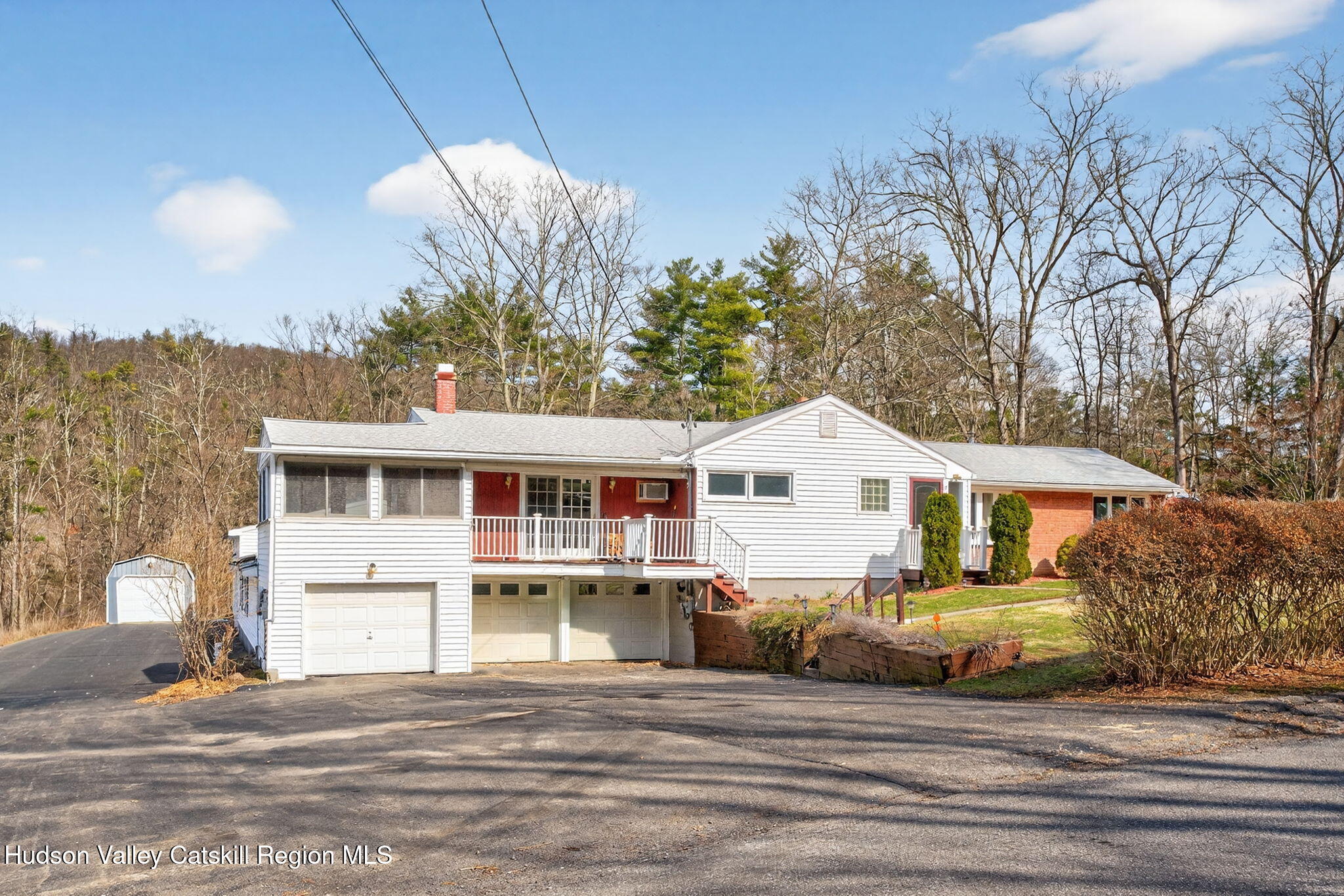 47 Meyers Road Kingston, NY 12401 - Photo 2 of 64 a front view of a house with a garden and trees