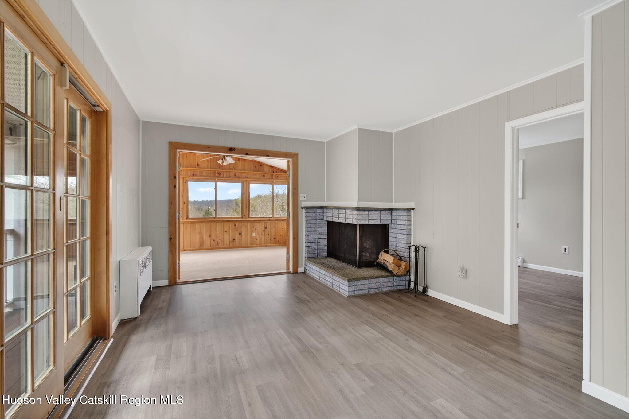 47 Meyers Road Kingston, NY 12401 - Photo 22 of 64 an empty room with furniture and a fireplace