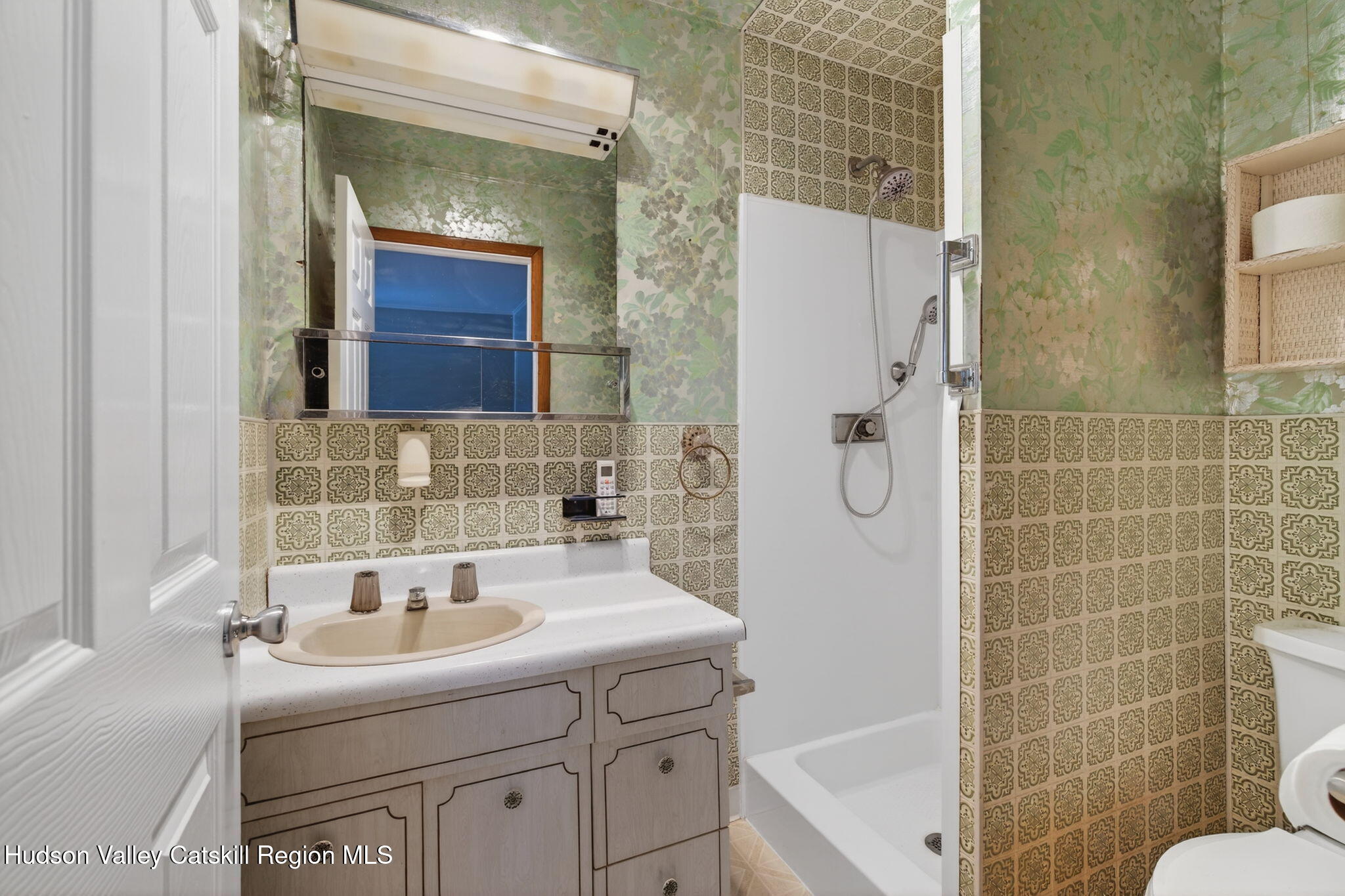 47 Meyers Road Kingston, NY 12401 - Photo 28 of 64 a bathroom with a sink and a mirror