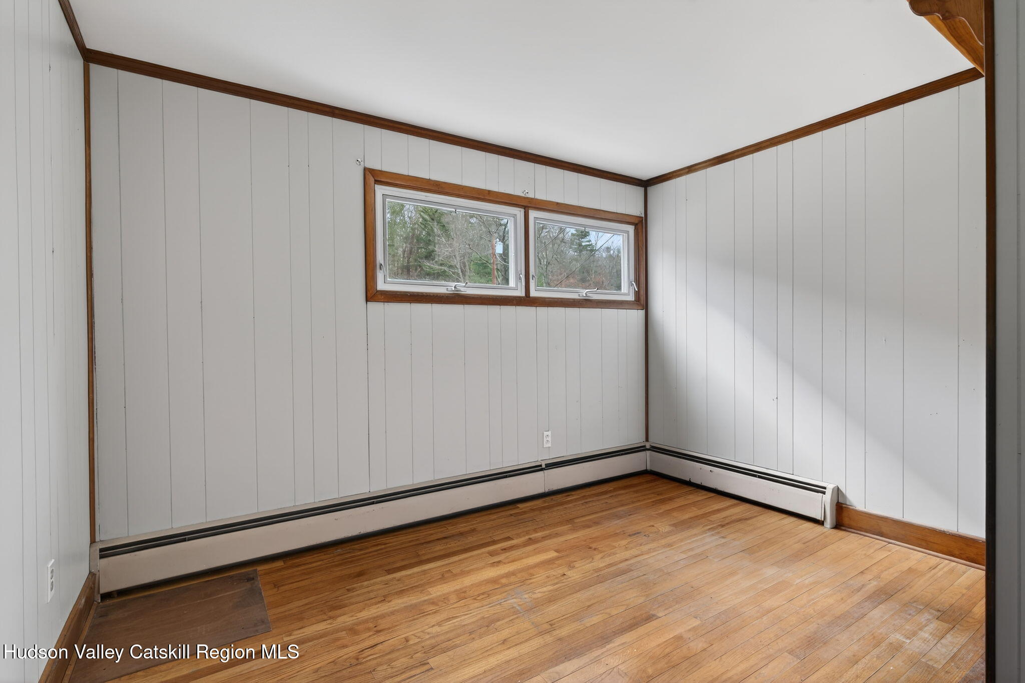47 Meyers Road Kingston, NY 12401 - Photo 32 of 64 a view of an empty room with wooden floor and a window