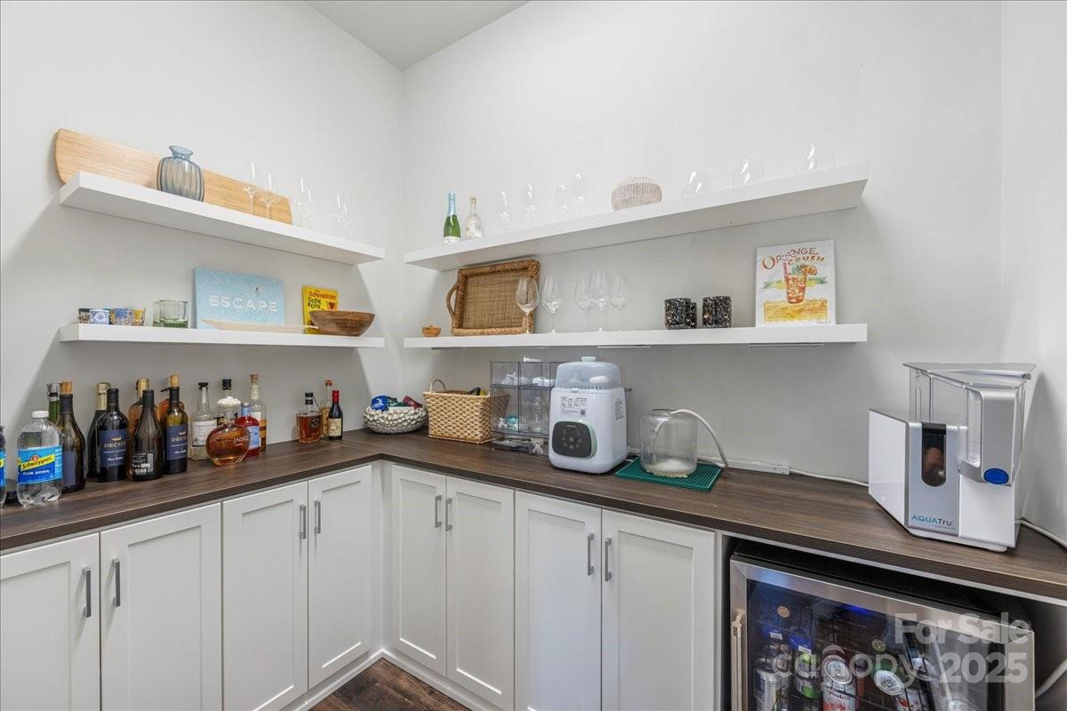11413 Miller Road Pineville, NC 28134 - Photo 12 of 45 a kitchen with cabinets and window