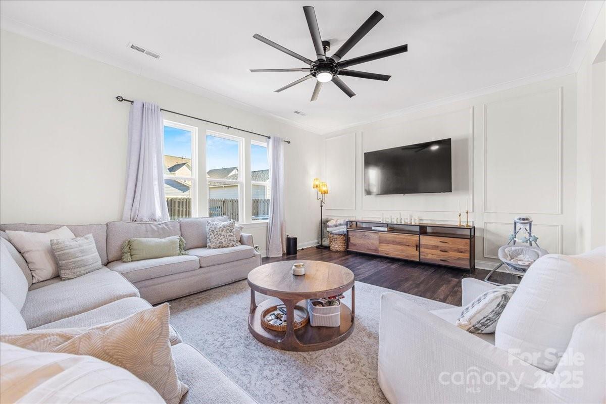 11413 Miller Road Pineville, NC 28134 - Photo 18 of 45 a living room with furniture and a flat screen tv