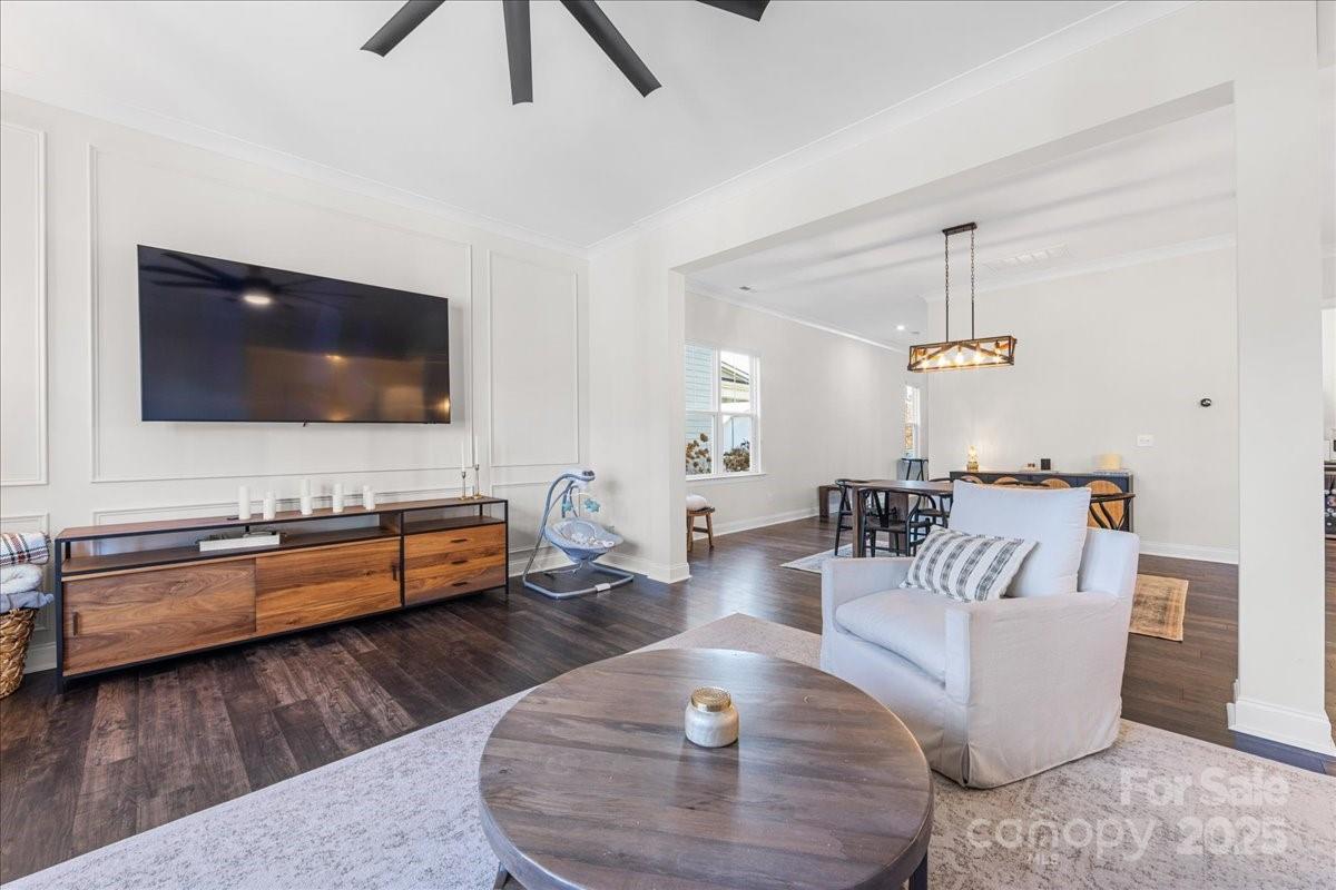 11413 Miller Road Pineville, NC 28134 - Photo 19 of 45 a living room with furniture and a flat screen tv
