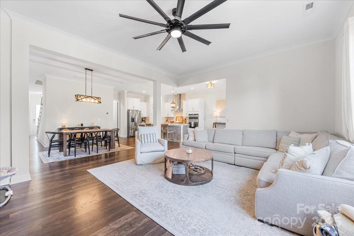 11413 Miller Road Pineville, NC 28134 - Photo 20 of 45 a living room with furniture and a wooden floor
