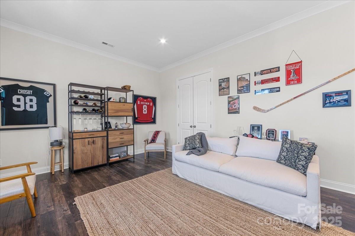 11413 Miller Road Pineville, NC 28134 - Photo 21 of 45 a living room with furniture and a flat screen tv