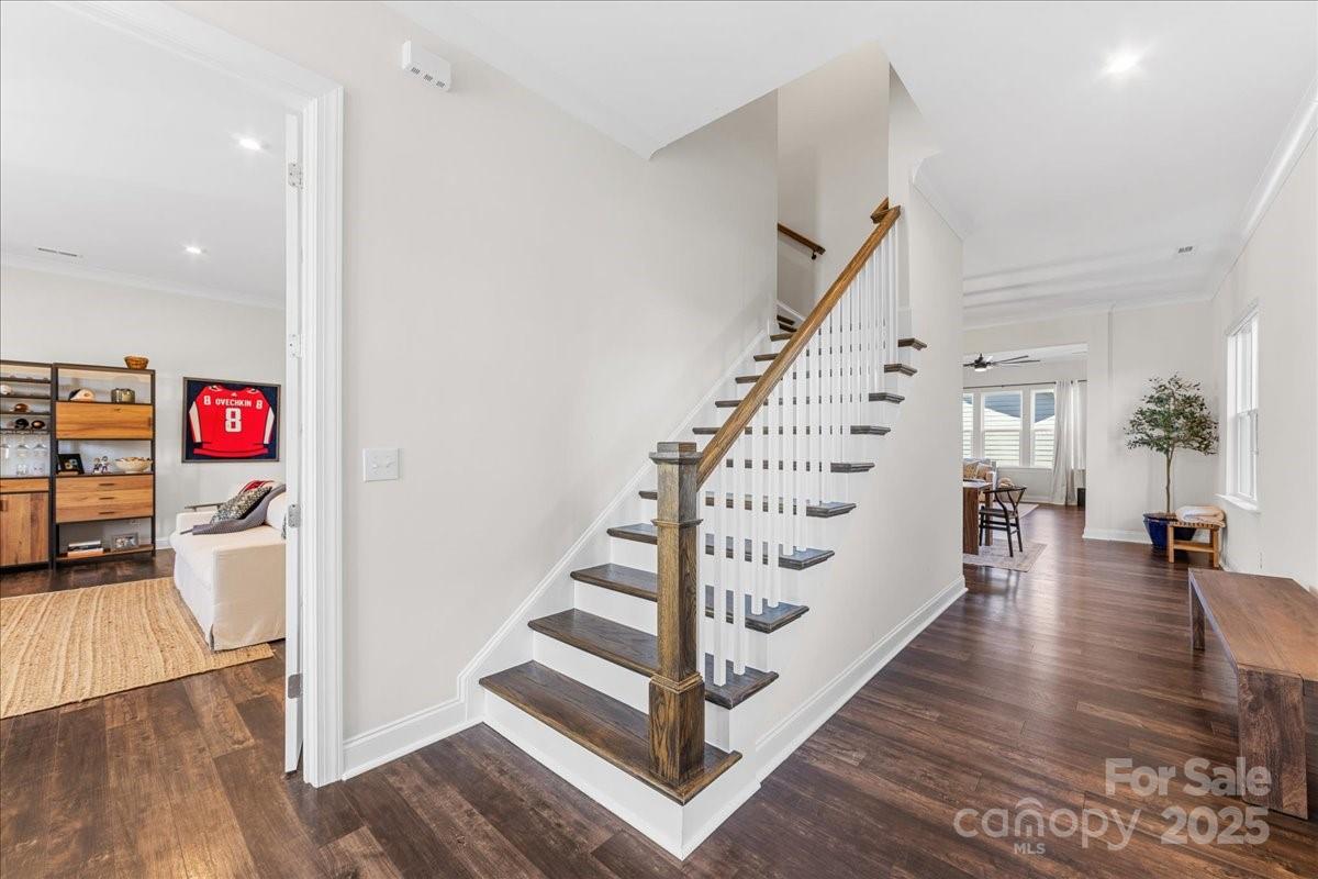 11413 Miller Road Pineville, NC 28134 - Photo 4 of 45 a view of entryway with stairs and wooden floor