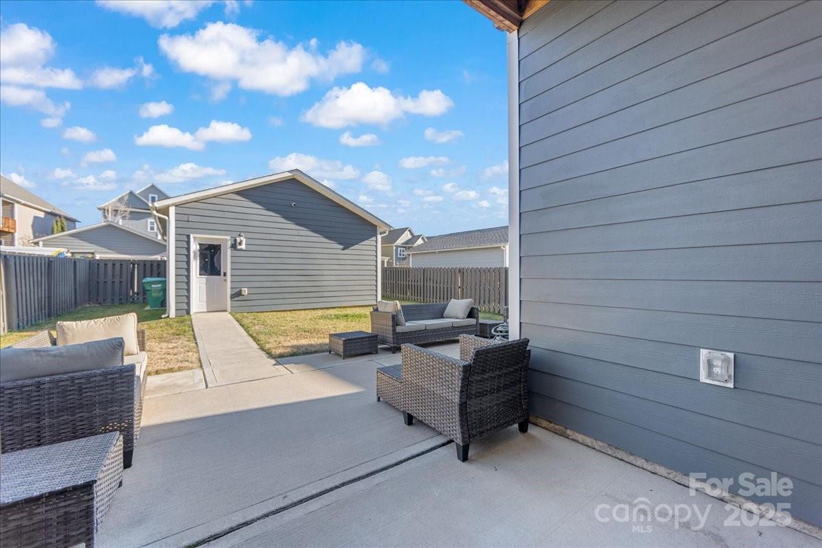 11413 Miller Road Pineville, NC 28134 - Photo 41 of 45 a view of patio with couches and a fire pit