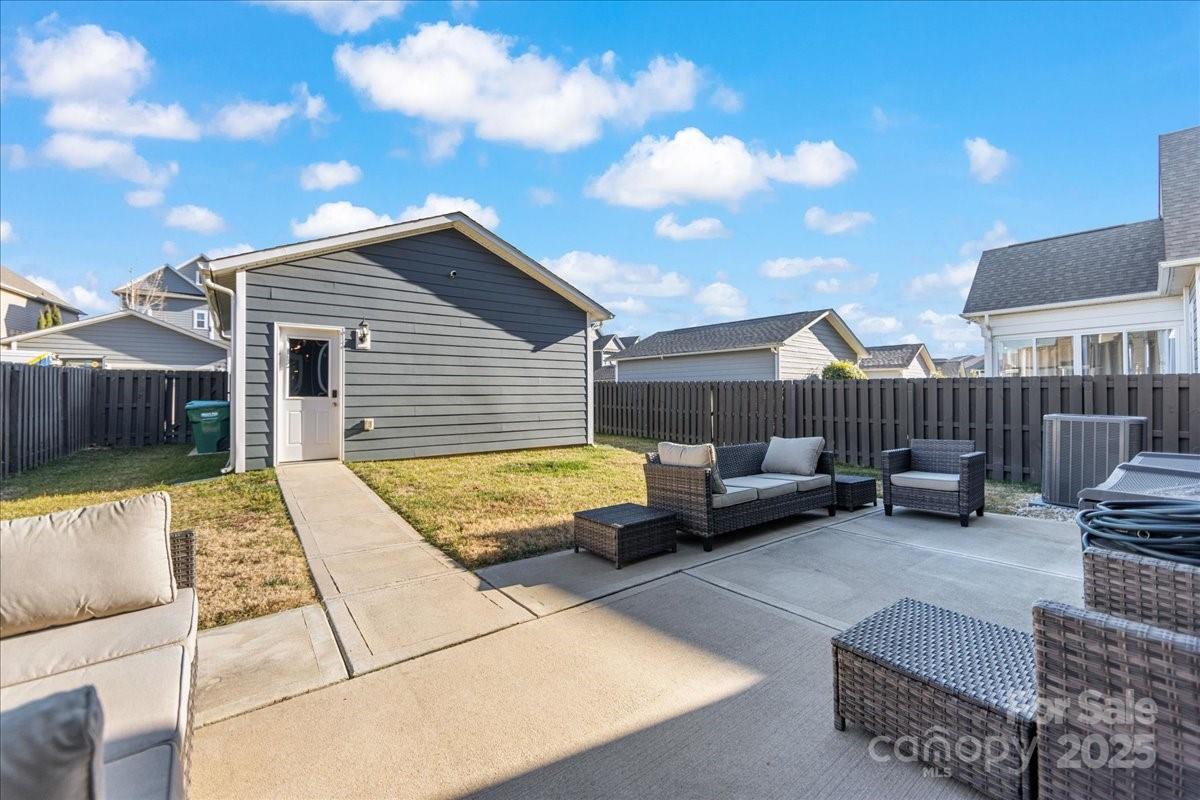 11413 Miller Road Pineville, NC 28134 - Photo 42 of 45 a view of backyard with swimming pool and furniture