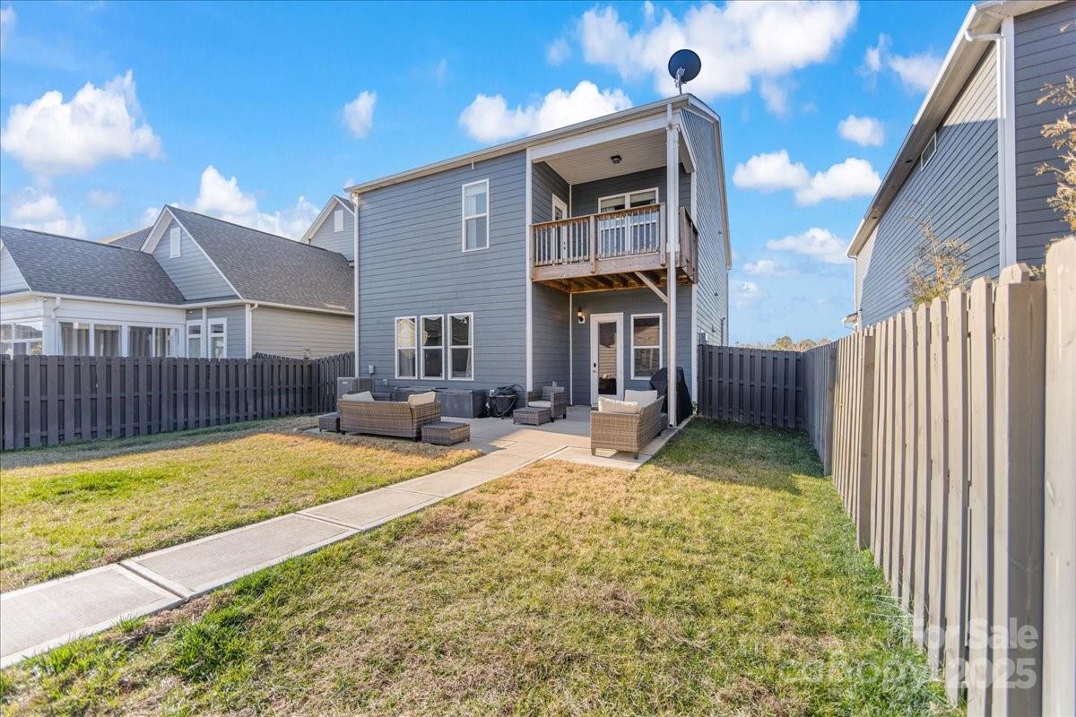 11413 Miller Road Pineville, NC 28134 - Photo 43 of 45 a view of a house with backyard and sitting area