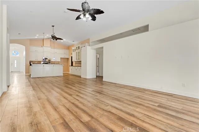 a view of a kitchen with a wooden floor