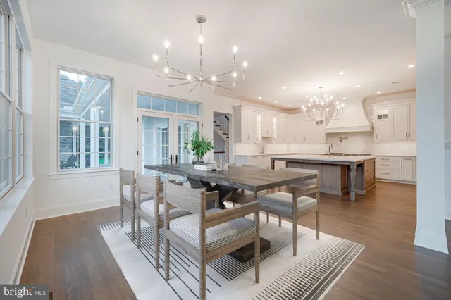 a bathroom with a toilet a sink and a mirror