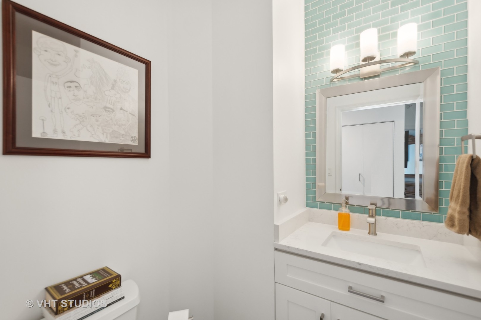 1101 South State Street, Unit 1800 Chicago, IL 60605 - Photo 11 of 18 a bathroom with a sink and a mirror