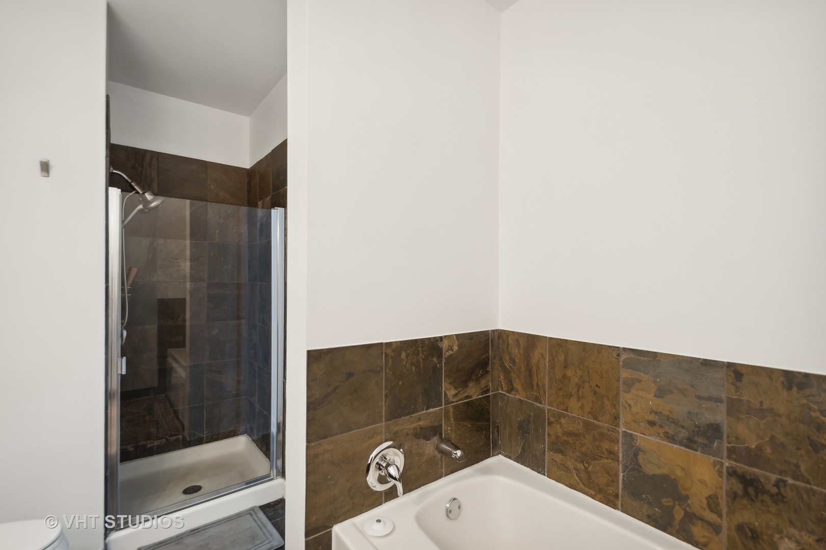 1101 South State Street, Unit 1800 Chicago, IL 60605 - Photo 13 of 18 a bathroom with a shower