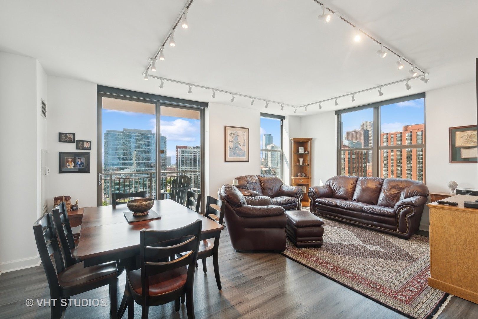1101 South State Street, Unit 1800 Chicago, IL 60605 - Photo 4 of 18 a living room with furniture and a large window