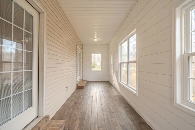 a view of a room with windows