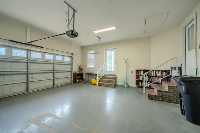 a view of a livingroom with gym equipment