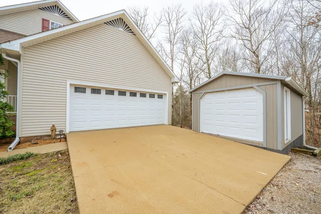 a view of a house with backyard