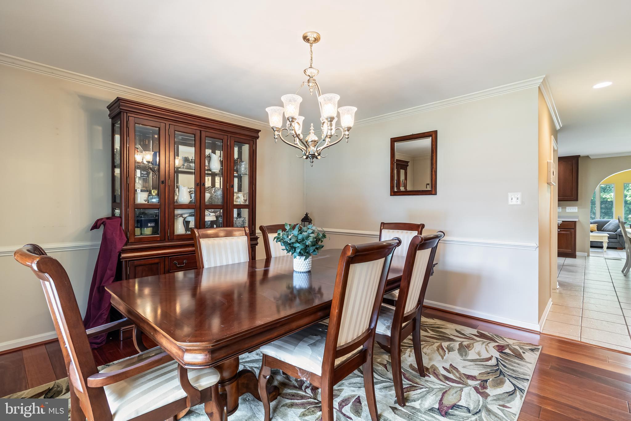 203 Morgans Ridge Court La Plata, MD 20646 - Photo 34 of 59 a view of a dining room with furniture window and wooden floor