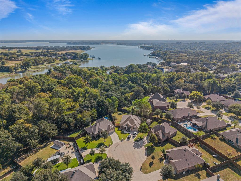 108 Bosque Court Azle, TX 76020 - Photo 2 of 37 an aerial view of a city with lots of residential buildings
