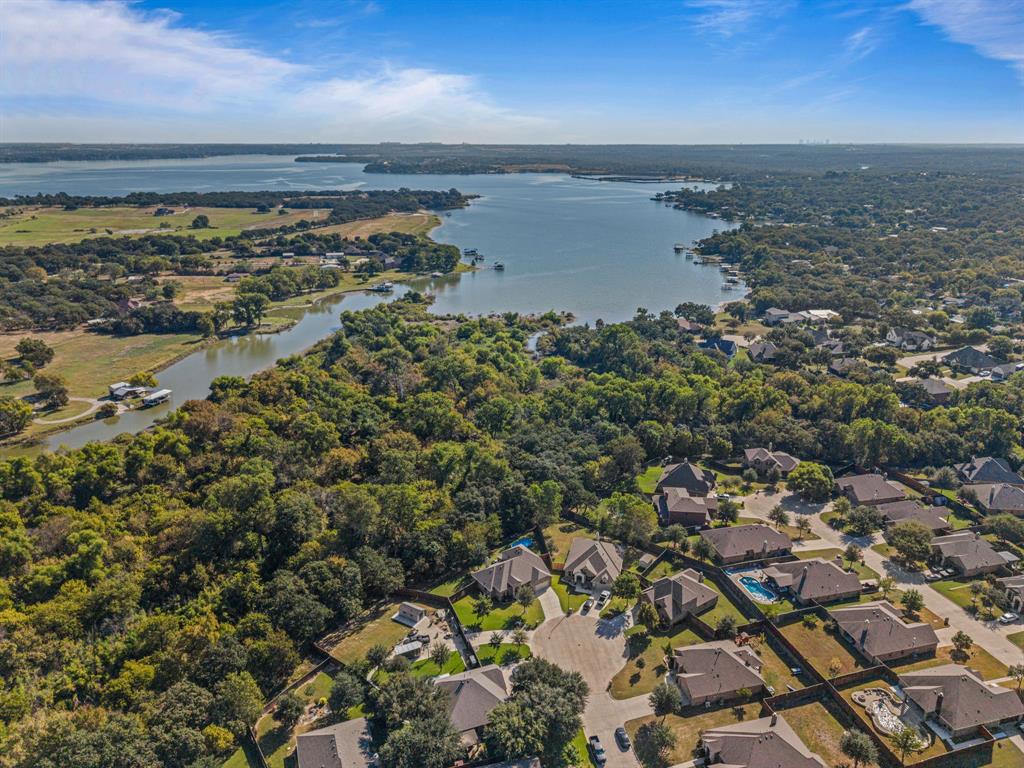 108 Bosque Court Azle, TX 76020 - Photo 29 of 37 an aerial view of ocean with residential houses with outdoor space