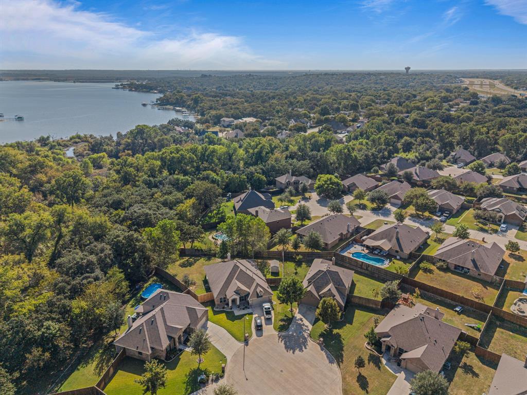 108 Bosque Court Azle, TX 76020 - Photo 31 of 37 an aerial view of residential building and lake