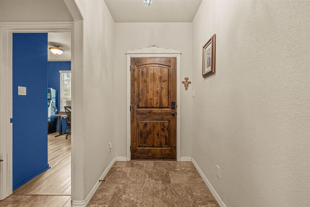 108 Bosque Court Azle, TX 76020 - Photo 7 of 37 a view of hallway with door