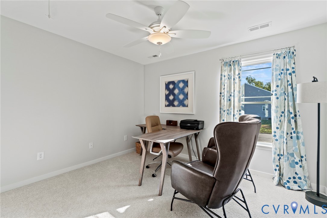 113 Logan Way Tappahannock, VA 22560 - Photo 20 of 33 a view of a workspace with furniture and a window