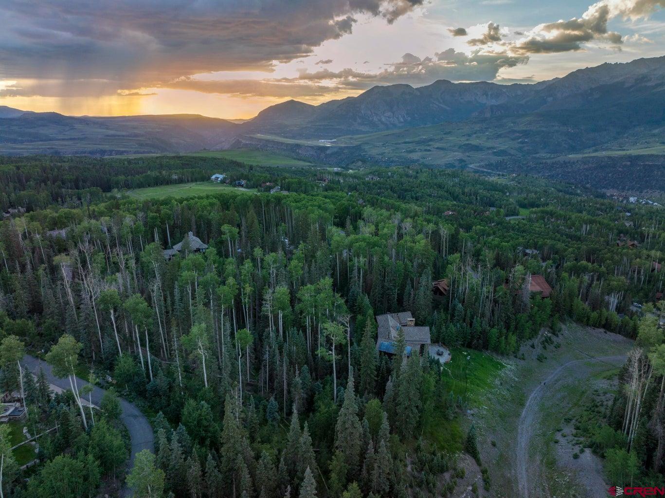 Tbd Lot 333 Benchmark Drive Telluride, CO 81435 - Photo 3 of 22 a view of a lush green hillside and a houses
