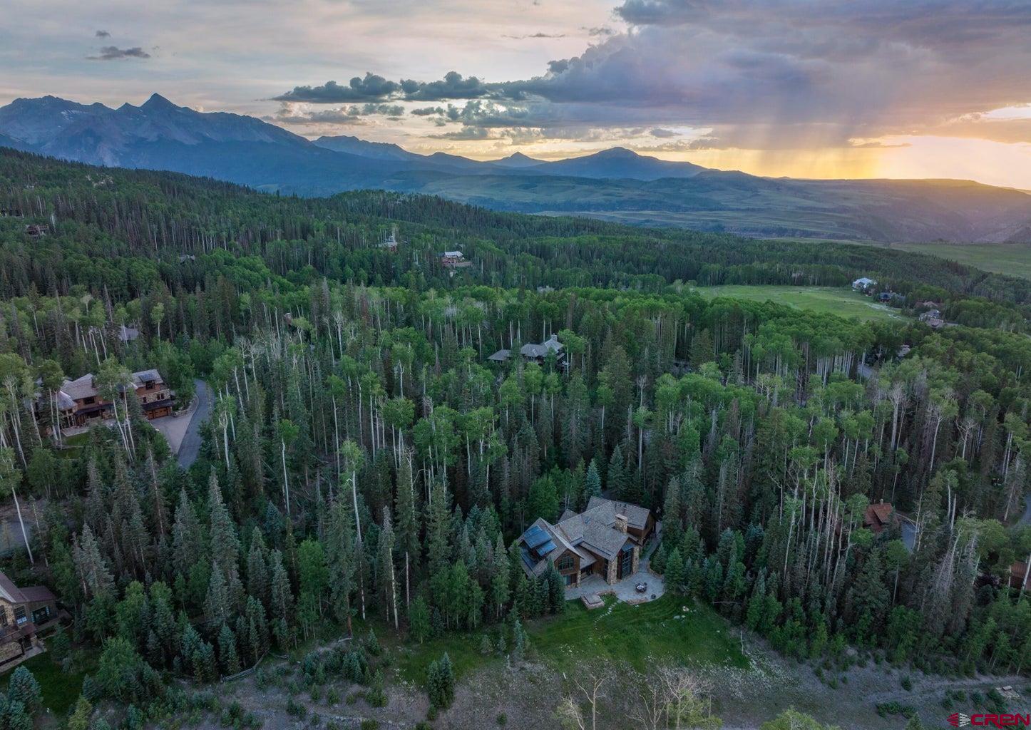 Tbd Lot 333 Benchmark Drive Telluride, CO 81435 - Photo 4 of 22 a view of a lush green hillside and a houses