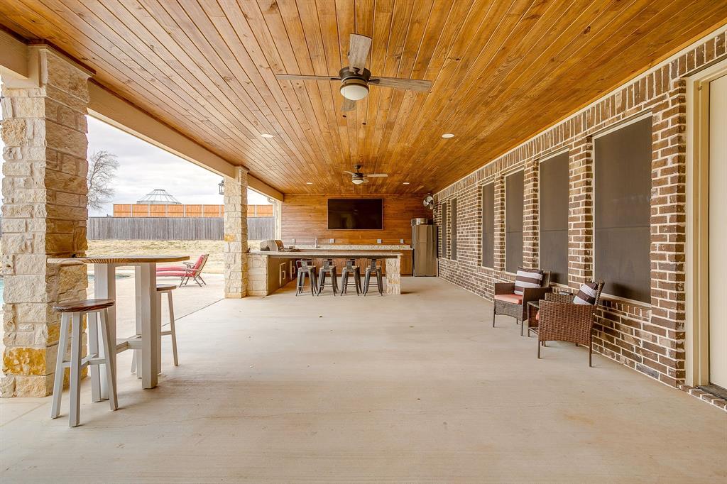 8895 Hutcheson Hill Road Springtown, TX 76082 - Photo 27 of 40 Back porch with full outdoor kitchen