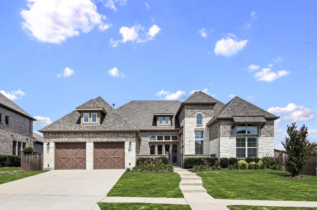 13702 Fernando Road Frisco, TX 75035 - Photo 1 of 1 a front view of a house with a yard