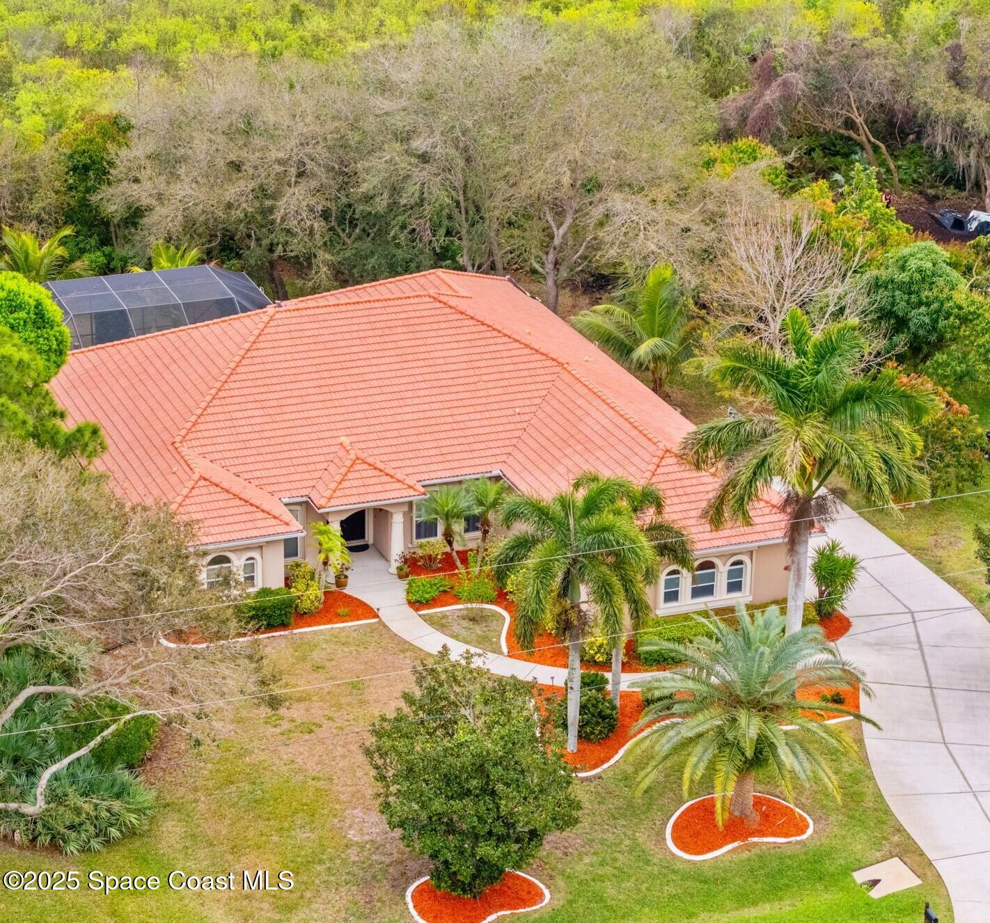 4443 Long Lake Road Melbourne, FL 32934 - Photo 11 of 75 64-web-or-mls-DJI_20250220121855_0145_D