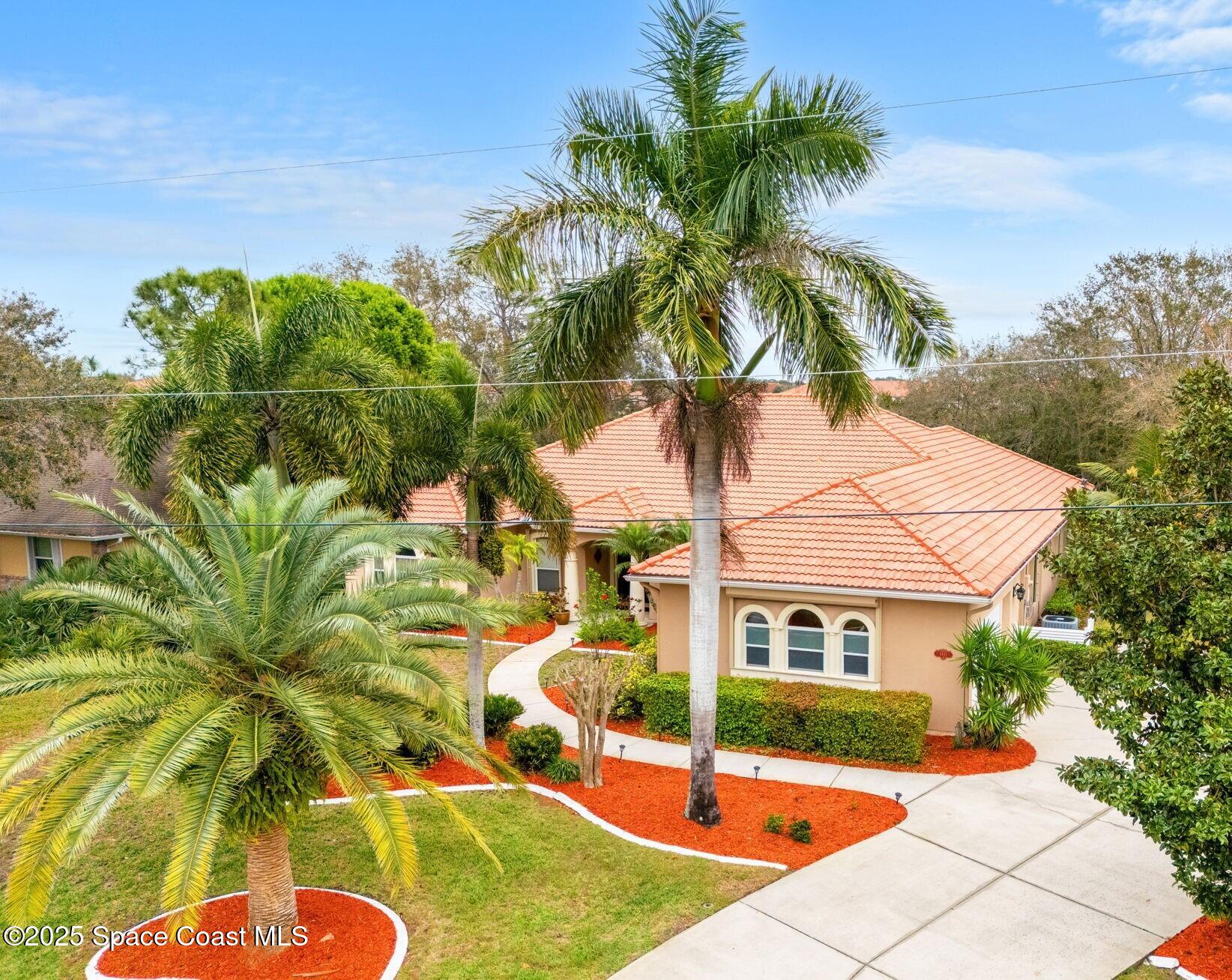 4443 Long Lake Road Melbourne, FL 32934 - Photo 8 of 75 78-web-or-mls-DJI_20250220121429_0135_D