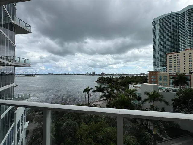 a view of swimming pool with outdoor seating