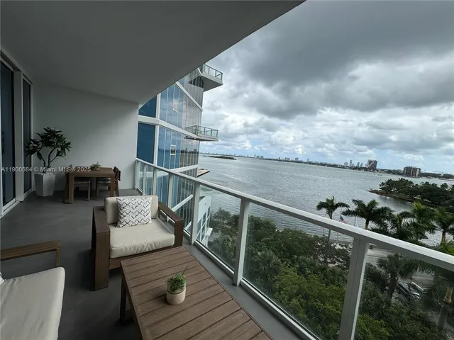 a view of balcony with a potted plant